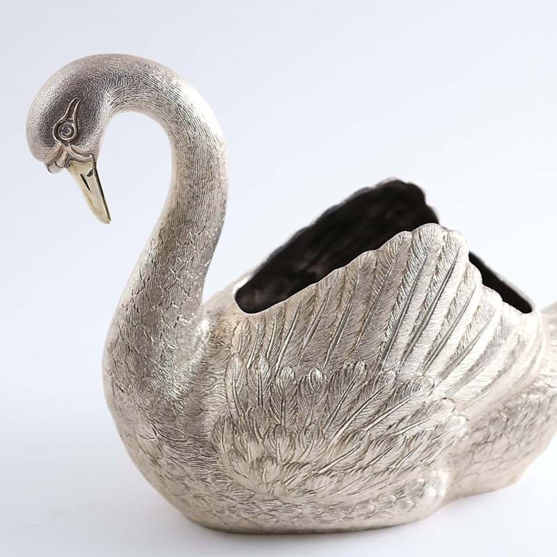 Silver Shines in 800-Lot Auction...